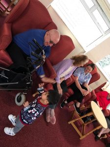 Preschoolers visiting care home