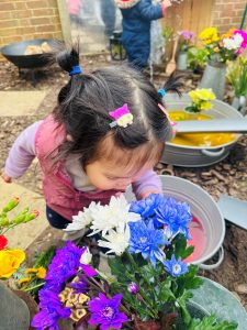 Child engaging in messy play