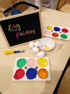 station set up for easter egg painting for little ones at nursery