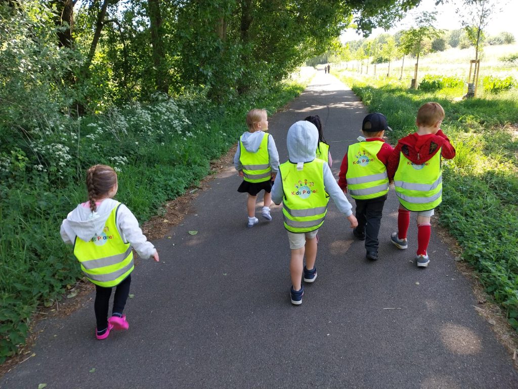 Children enjoying outdoor learning at Kids Planet