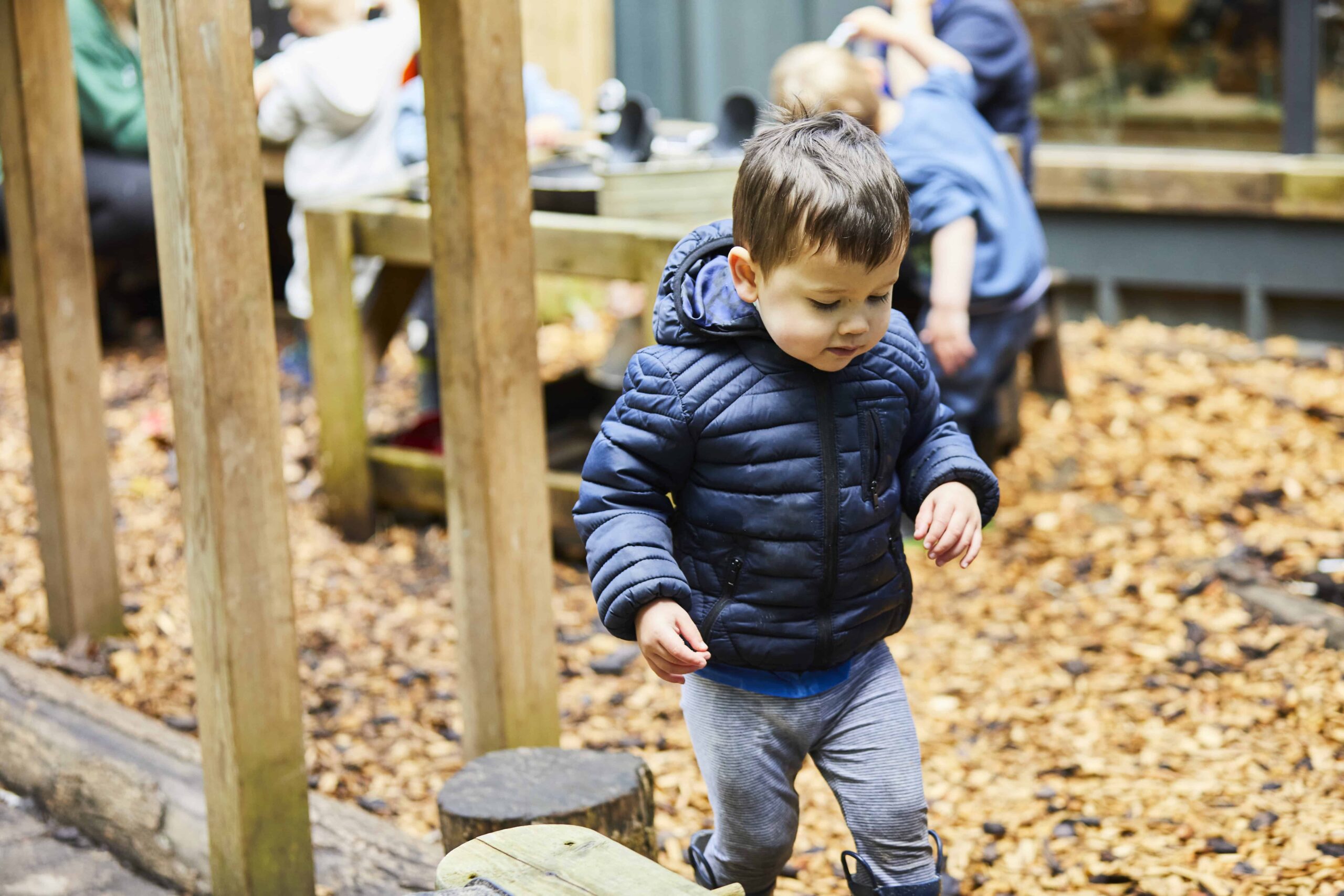 image of small nursery children playing in the nursery garden area