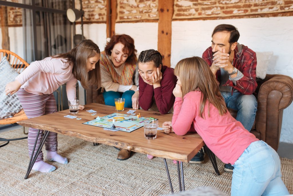 Family playing board games together