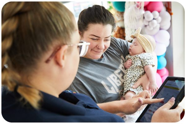 New mum visiting a kids planet nursery